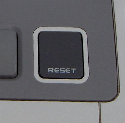 Photo du bouton reset de la console Super Nintendo