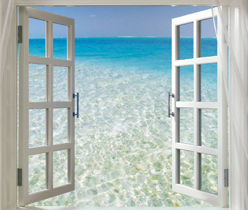 Photo d'une fenêtre qui donne sur la mer